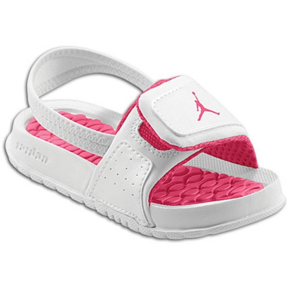 pink and white jordan slides